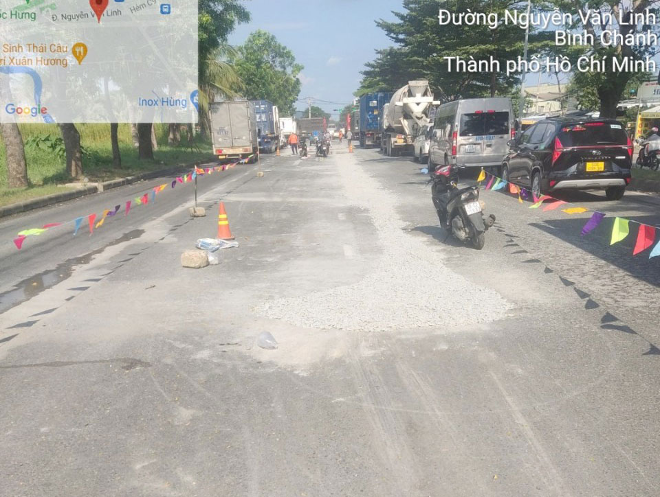 TP.HCM: Khắc phục xong tình trạng xuống cấp đường Nguyễn Văn Linh - Ảnh 2.