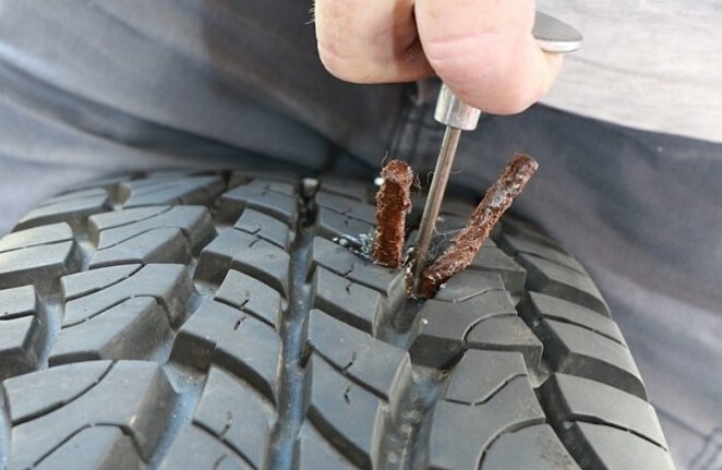 Có nên vá dùi lốp ô tô không săm? - Ảnh 1.