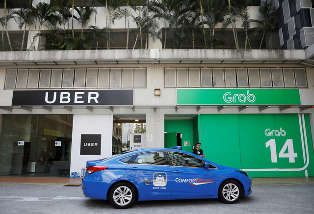 Uber sáp nhập vào Grab, dân Singapore nói không có