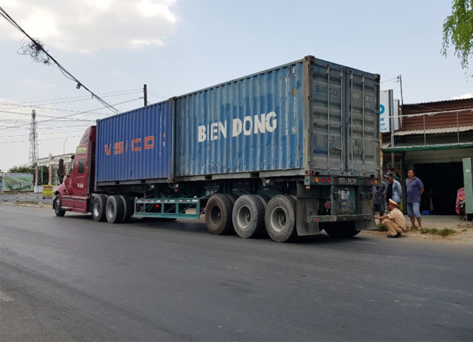 nguoi-dan-ong-co-3-con-nho-bi-container-can-chet-t