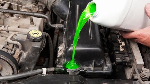 neon-green-coolant-poured-into-3187-5156-149818922