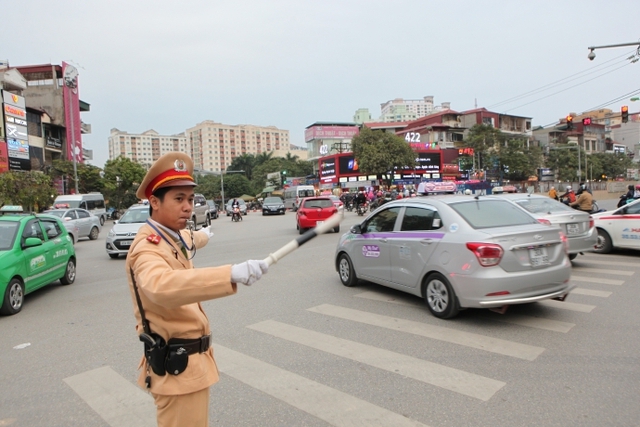 Từ chiều 12/12, Hà Nội cấm nhiều tuyến đường, loại xe để đón khách quốc tế- Ảnh 1.