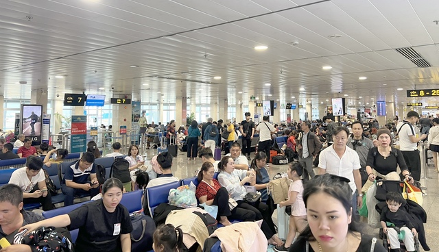 Sân bay Tân Sơn Nhất dự kiến đón kỷ lục gần 148.000 khách dịp cao điểm Tết- Ảnh 1.