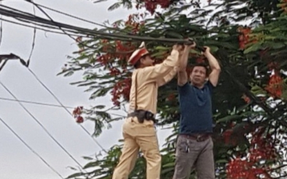 CSGT Thủ đô xử trí an toàn vụ dây cáp “bẫy” người đi đường