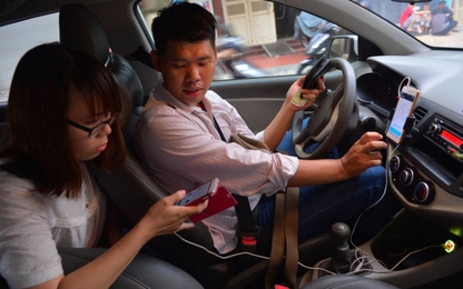 Bộ GTVT "thổi còi" dịch vụ đi chung xe của Grab, Uber