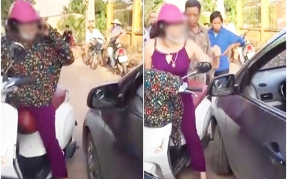 Clip: Bị nhắc nhở, người phụ nữ chửi bới, lao vào đánh lái xe ôtô
