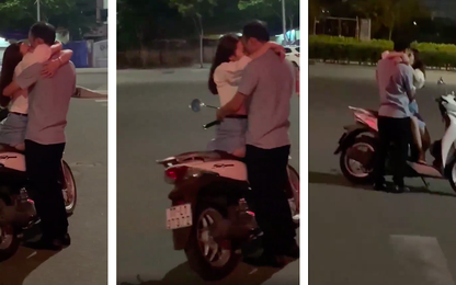 Cặp đôi vô tư dừng xe giữa đường ôm hôn ngấu nghiến