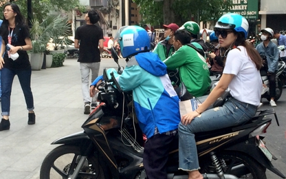 Nhiều tài xế Uber âu lo khi về "chung một nhà" với Grab