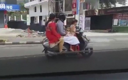 Clip bé gái 5 tuổi chở cả gia đình trên xe máy