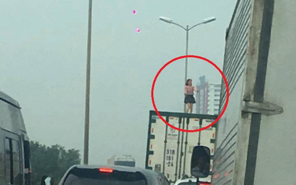 Clip: Cô gái vô tư nhảy múa trên xe container đang chạy
