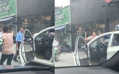 Tài xế taxi rút gậy tấn công bảo vệ vì không cho đỗ xe