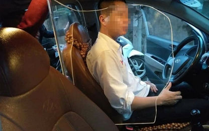 Lắp đặt khoang chắn bảo vệ, tài xế taxi có làm trái pháp luật?